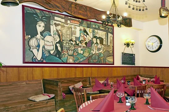 Grand tableau alsacien au-dessus des banquettes